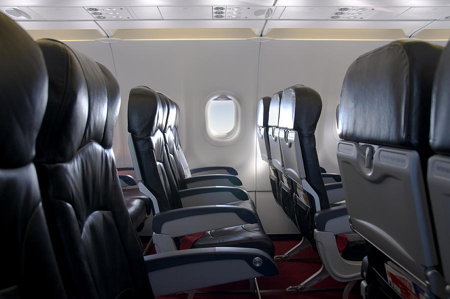Premium Economy Class Seating Inside An Airplane Cabin Photograph by Tbradford