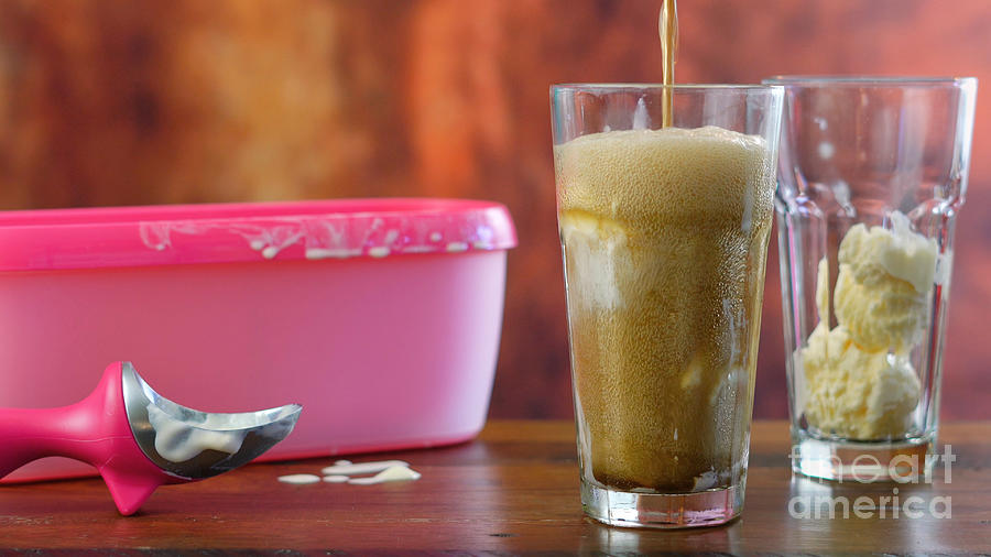 Ice Cream Photograph - Preparing black cow cola ice cream soda floats by Milleflore Images