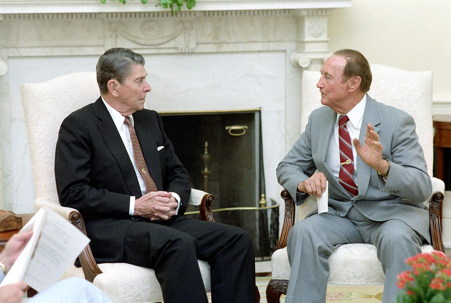 President Reagan and Senator Strom Thurmond - Oval Office 1987 Photograph by War Is Hell Store