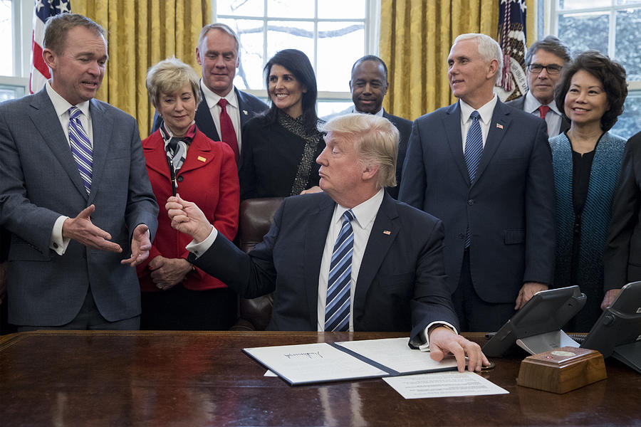 President Trump Signs Executive Order In Oval Office Photograph by Pool President Trump Signs Executive Order In Oval Office Photograph by Pool