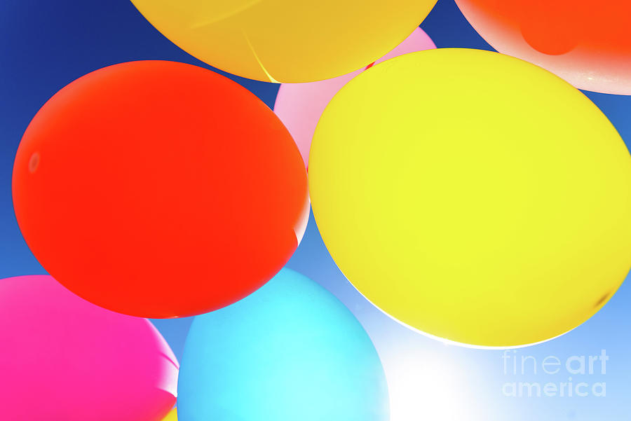 Pretty Sunlit Solid Color Balloons Viewed From Below With Blue S Photograph