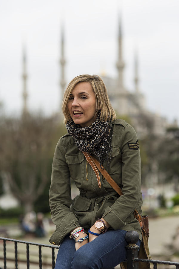 Pretty traveller woman - Blue mosque (Sultanahmet) in the background Photograph by Ruzgar344