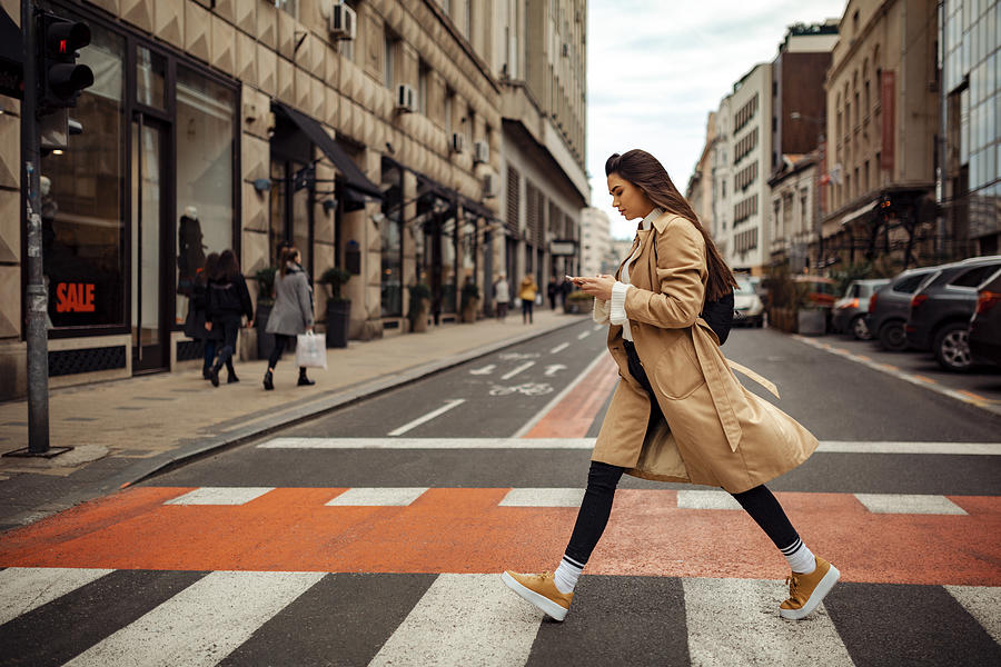 Pretty woman crossing the street Photograph by Ivan Pantic