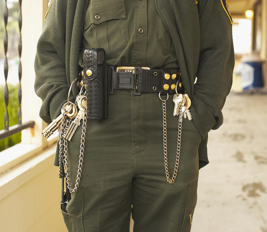 Prison guard with keys on belt (mid section) Photograph by Nikolaevich
