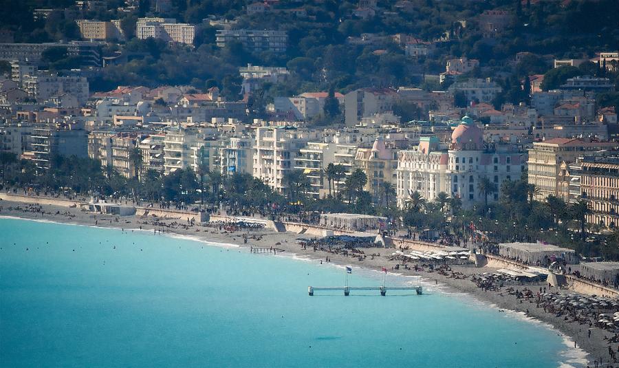 Promenade des Anglais and Negresco Hotel facing the turquoise blue sea. Photograph by Jean-Luc Farges