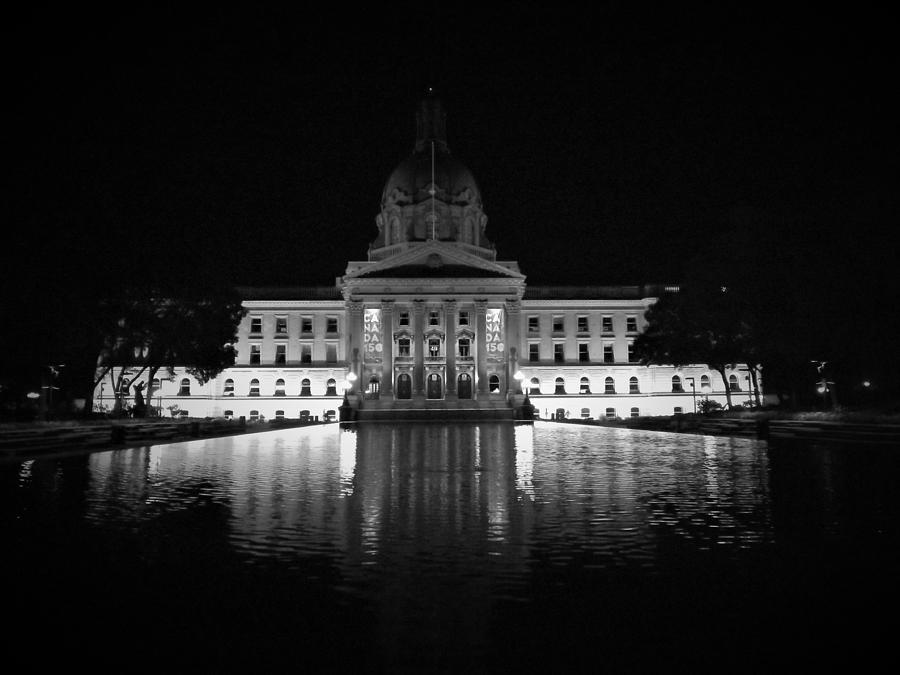Province of Alberta Legislature Reflecting at Night Black and White Photograph by James Cousineau