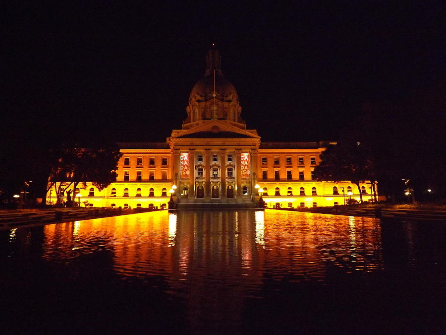 Province of Alberta Legislature Reflecting at Night Photograph by James Cousineau