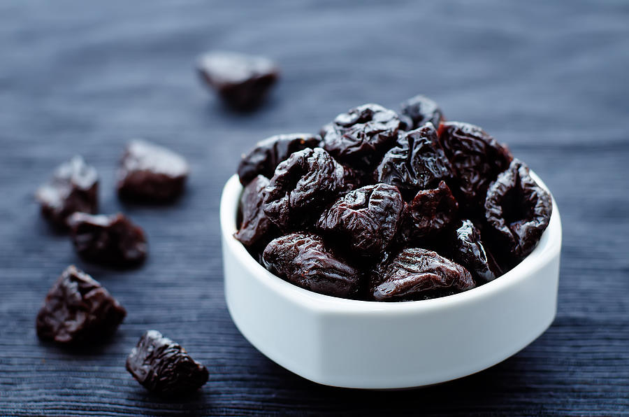 Prunes In A Bowl Photograph by Nata_vkusidey