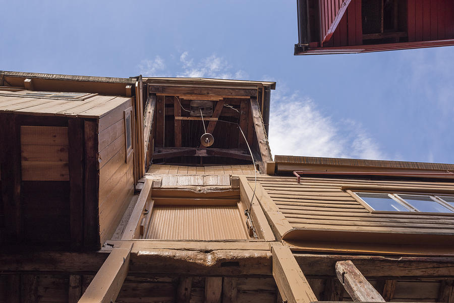 Pulley at an 18th century storehouse at Bryggen wharf in Bergen in Norway Photograph by Silkfactory