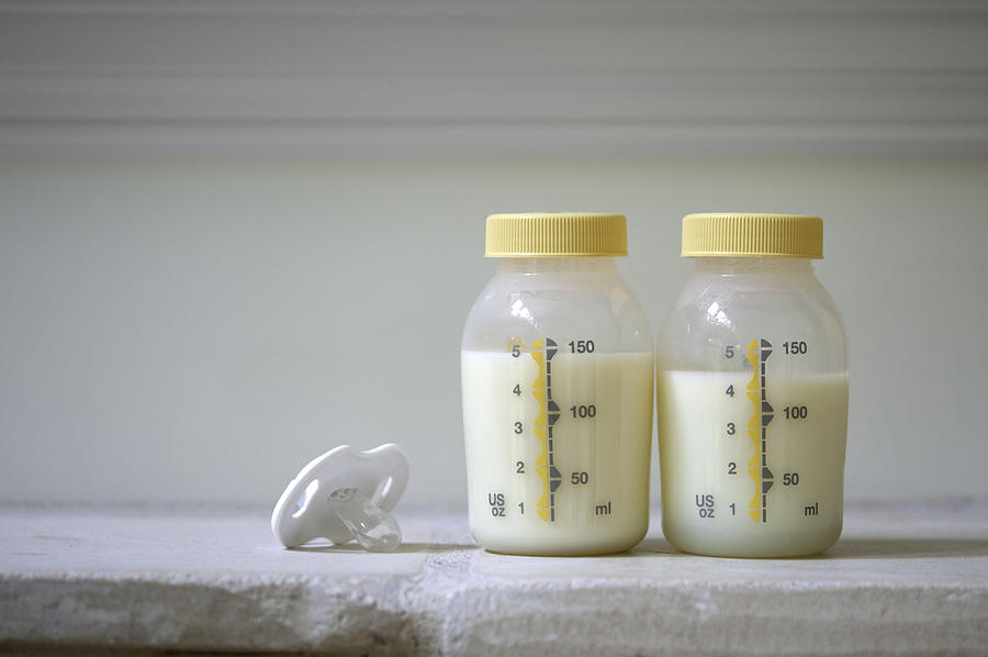 Pumped breast milk Photograph by Ceneri