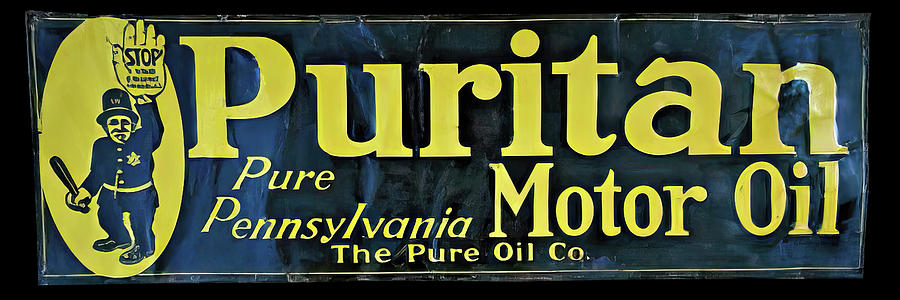 Puritan Motor Oil Company vintage sign Photograph by Flees Photos
