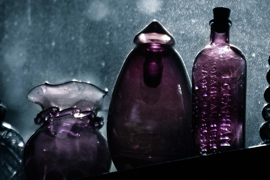 Purple Bottles in a Window Photograph by Wayne King