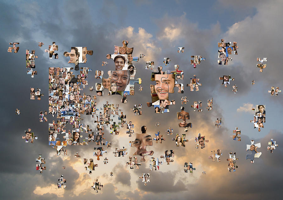 Puzzle pieces with smiling faces floating in cloudy sky Photograph by John M Lund Photography Inc