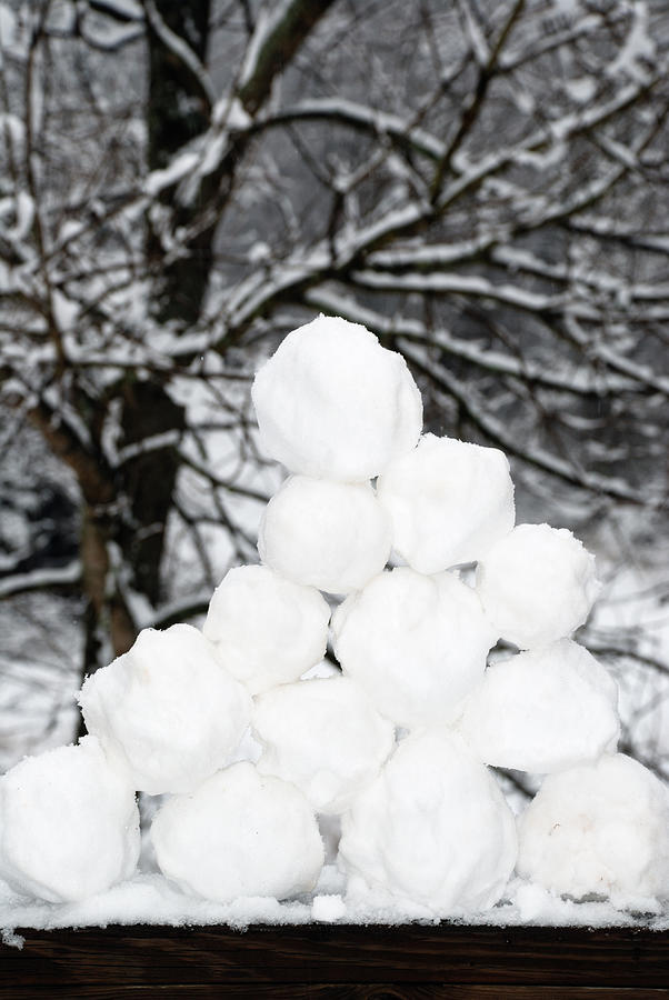 Pyramid of snowballs Photograph by NoDerog