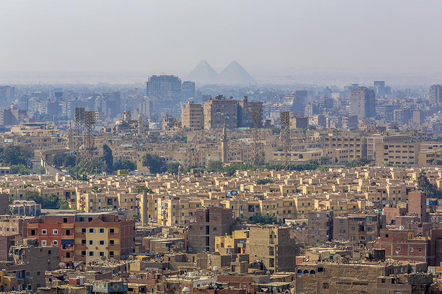 Pyramids silhouettes over Cairo, Egypt Photograph by Gargolas