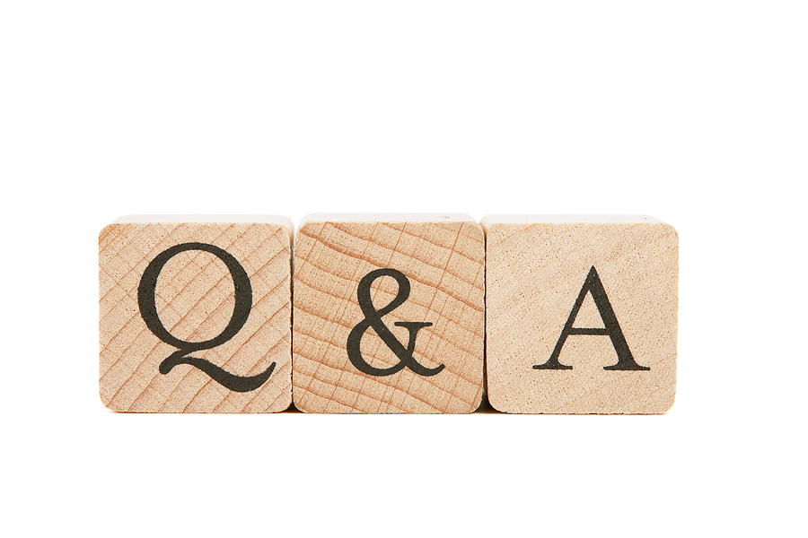Q&A word made of wooden cubes, isolated on white background Photograph by Yevgen Romanenko