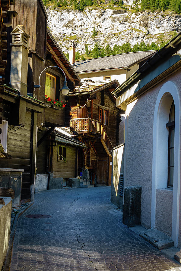 Quaint street in Zermatt Photograph by Alexey Stiop