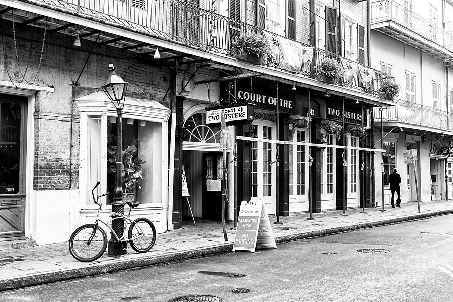 Quarter Street in New Orleans Photograph by John Rizzuto
