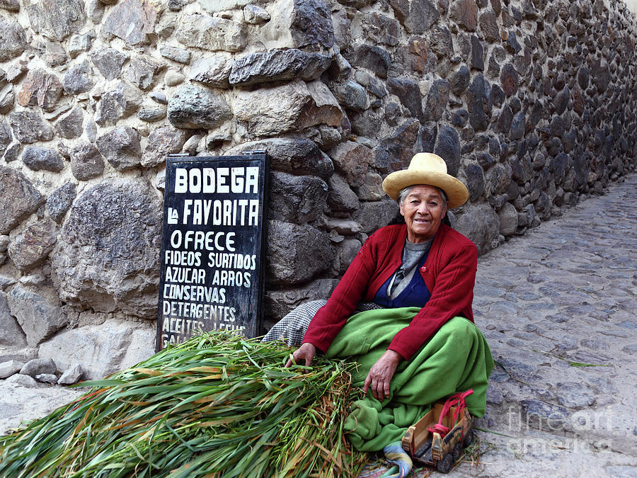 Quechua lady selling animal fodder Peru Photograph by James Brunker