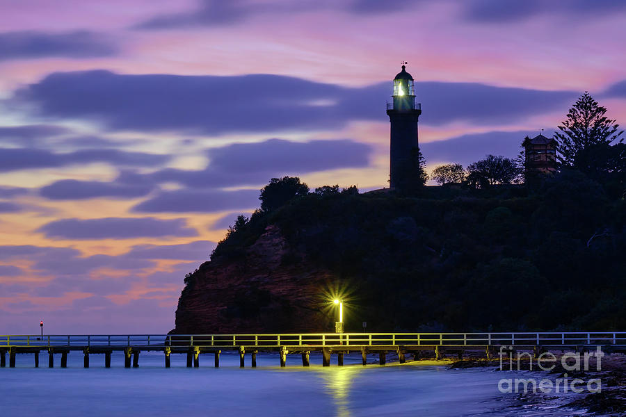 Queenscliff Lighthouse Against A Sunset Sky Photograph by Neil Maclachlan