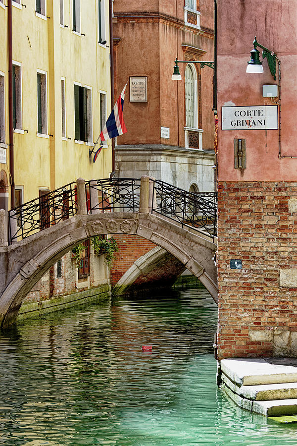 Quiet Canal in Venice Italy Photograph by John Gilham