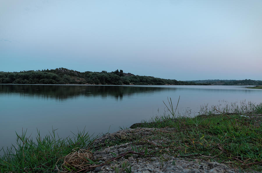 Quiet times in Povoa e Meadas Dam Photograph by Angelo DeVal