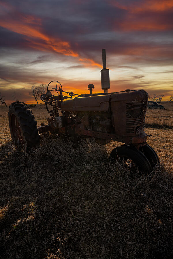 Sunset Photograph - Quittin Time by Aaron J Groen