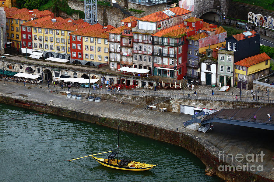 Boat Photograph - Rabelo boat moored on the River Douro waterfront Ribeira Porto Portugal by James Brunker