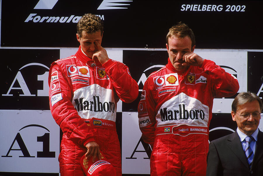 Race winner Ferrari driver Michael Schumacher of Germany and runner-up Ferrari driver Rubens Barrichello of Brazil Photograph by Tom Shaw
