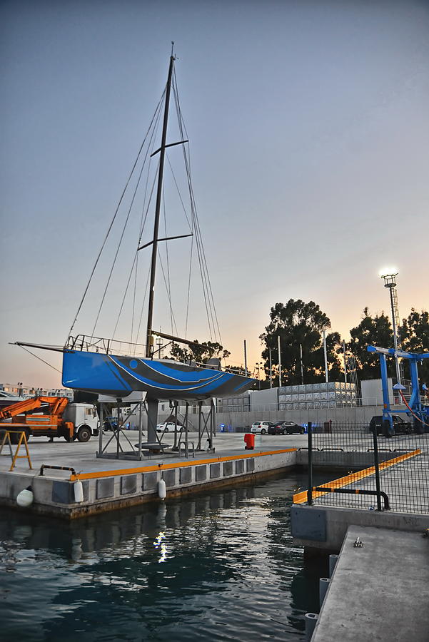 Racing boat on stands,evening view Photograph by Emreturanphoto