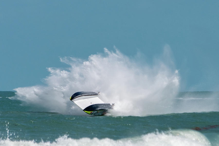 Racing powerboat capsizing Photograph by Bradford Martin