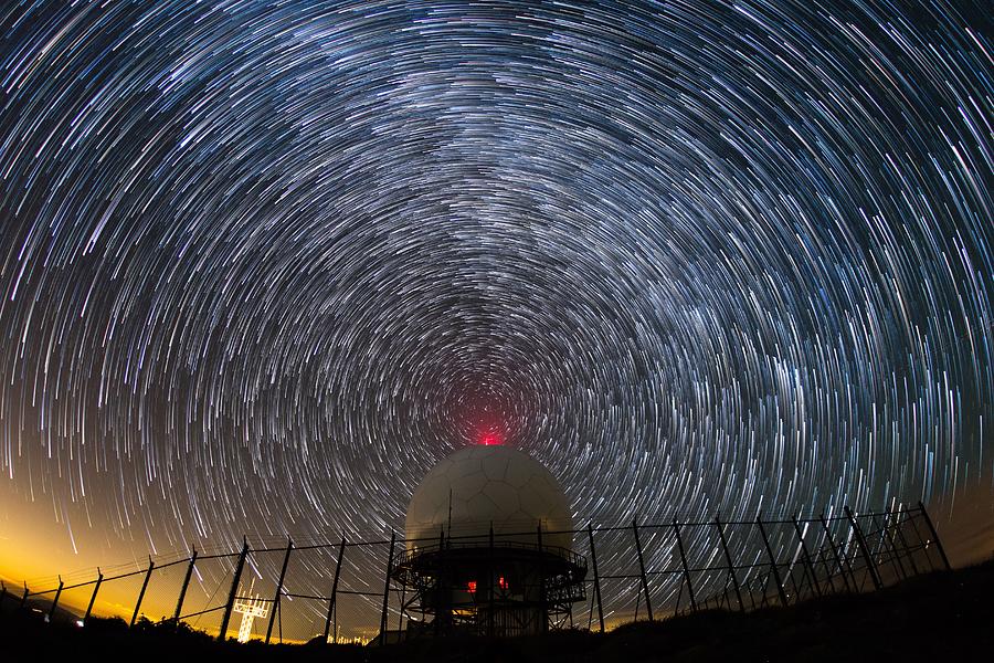 Radio waves. Star trails around radar dome Photograph by Kevin Key / Slworking