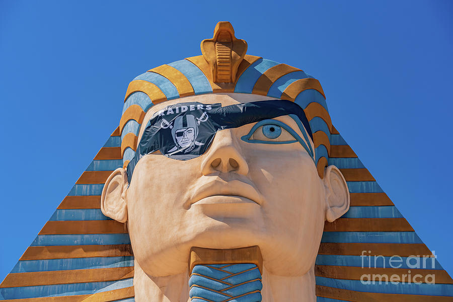 Architecture Photograph - Raiders eye patch on the Sphinx of Luxor Casino by Chon Kit Leong