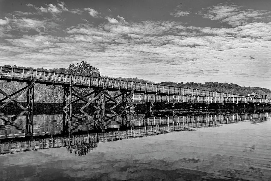 Rail trail bridge reflection BW Photograph by Dan Friend