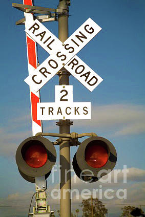 RAILROAD EQUIPMENT - Railroad Crossing  Photograph by John and Sheri Cockrell