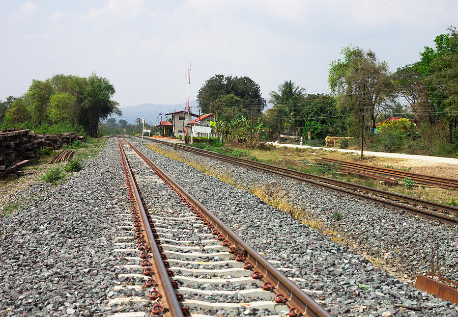 Railway Tracks On Background Of Scenery Photograph by Borirak