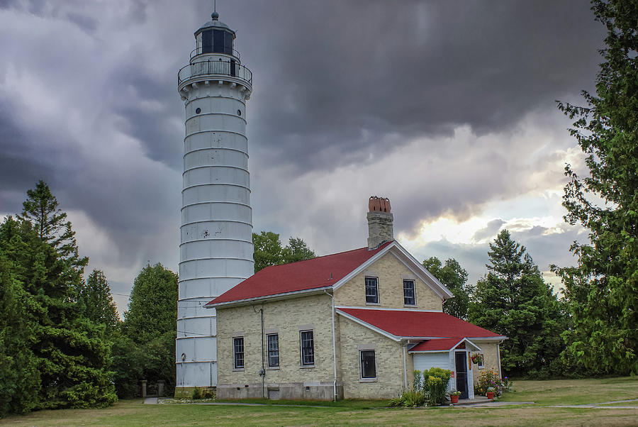 Rain Clouds at Cana Island Lighthouse Photograph by Deb Beausoleil