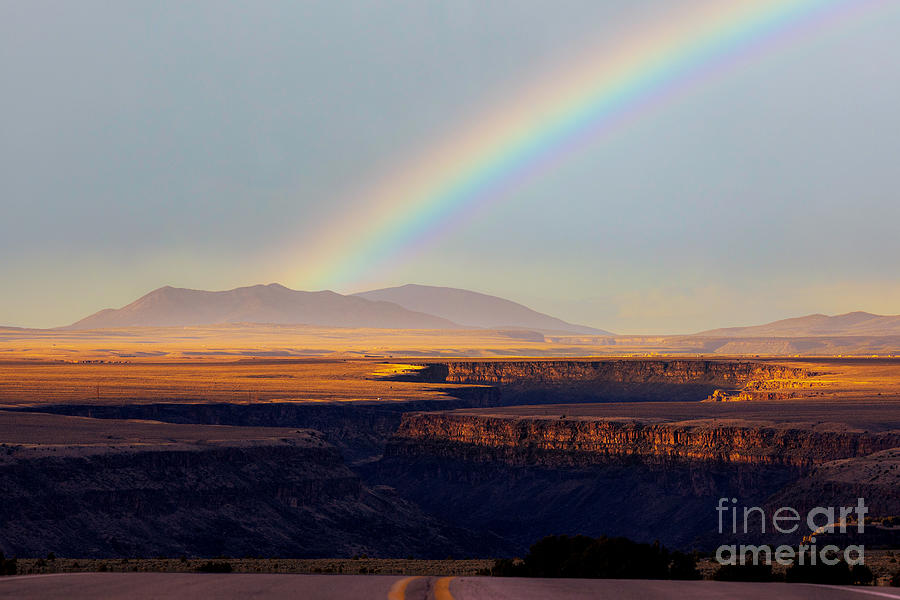 Rainbow crossing the Rio Grande Gorge  #1 Photograph by Elijah Rael