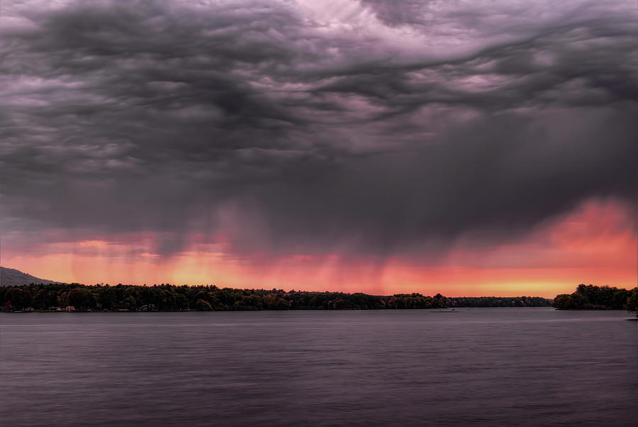 Rain Shafts Over Lake Wausau Photograph by Dale Kauzlaric