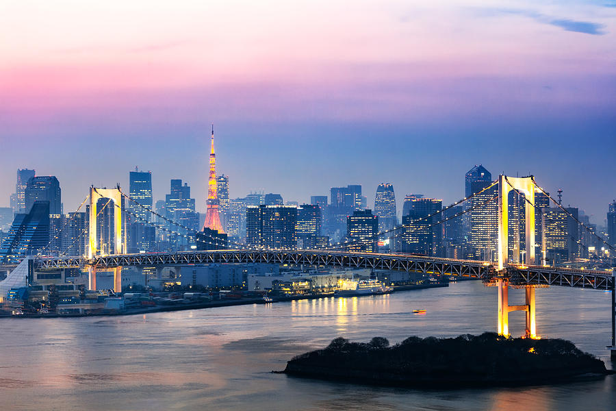 Rainbow bridge and skyline at sunset, Tokyo, Japan Photograph by Matteo Colombo