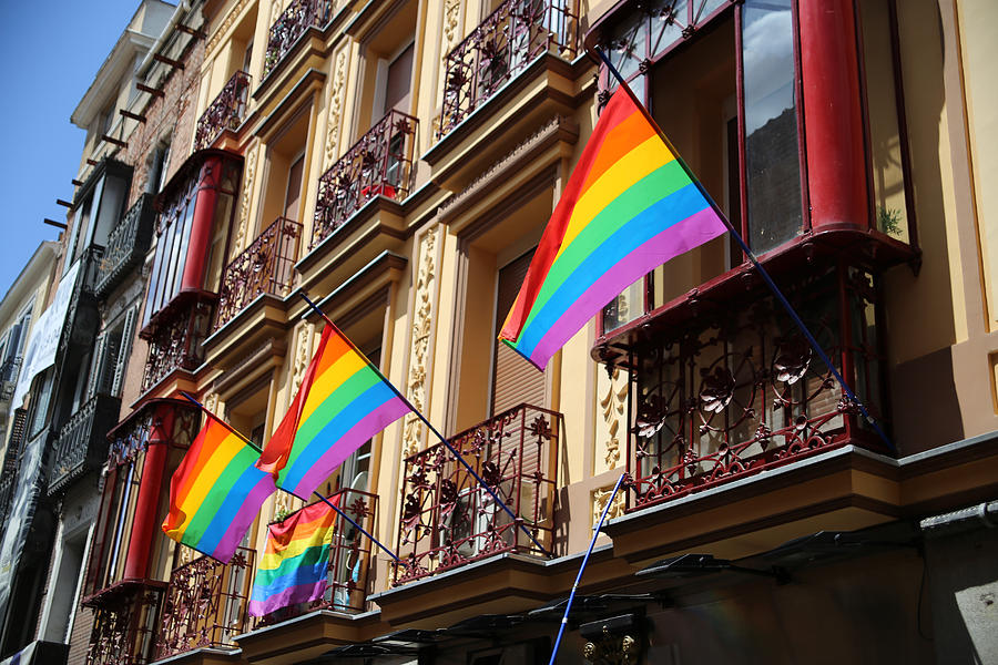 Rainbow flags hanging from balconies in Madrid Photograph by Busà Photography