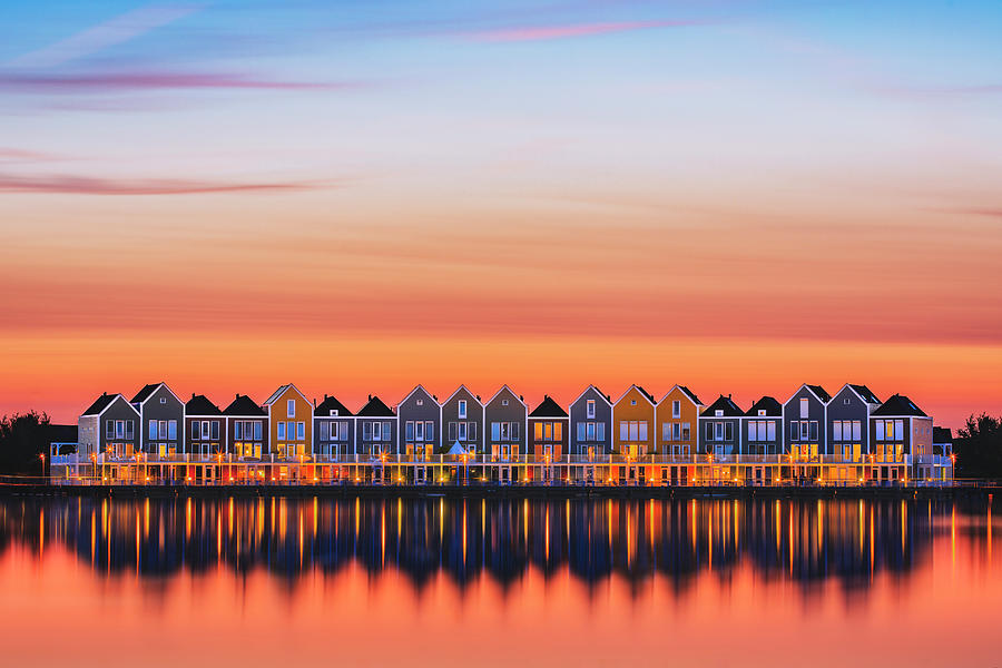 Rainbow houses during sunset Photograph by Patrick Van Os