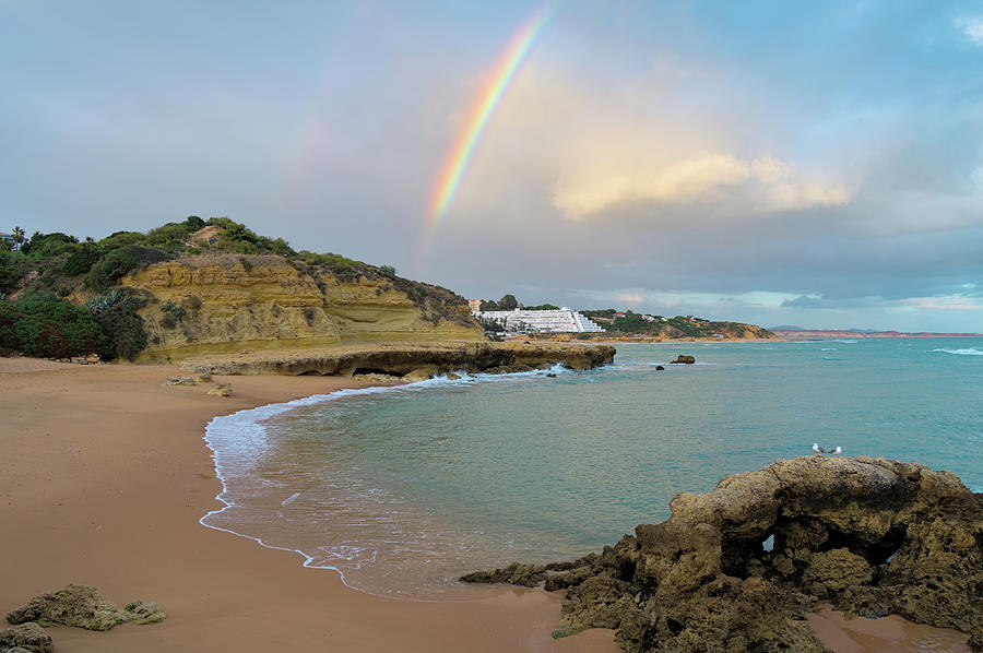 Rainbow in Aveiros Beach Photograph by Angelo DeVal