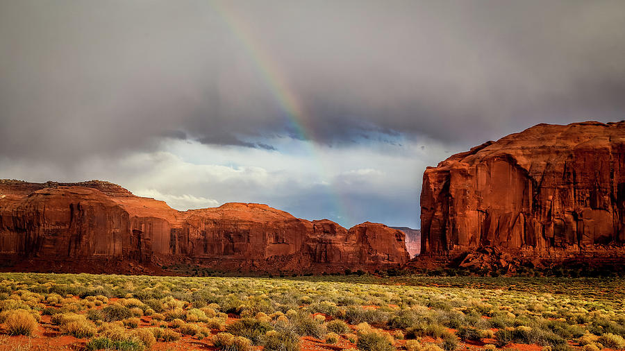 rainbow in Monument valley  Photograph by Alberto Zanoni