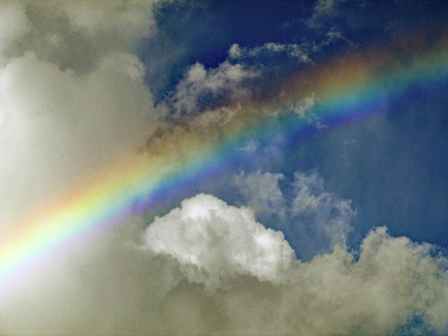 Rainbow in the Clouds Photograph by Corinne Carroll