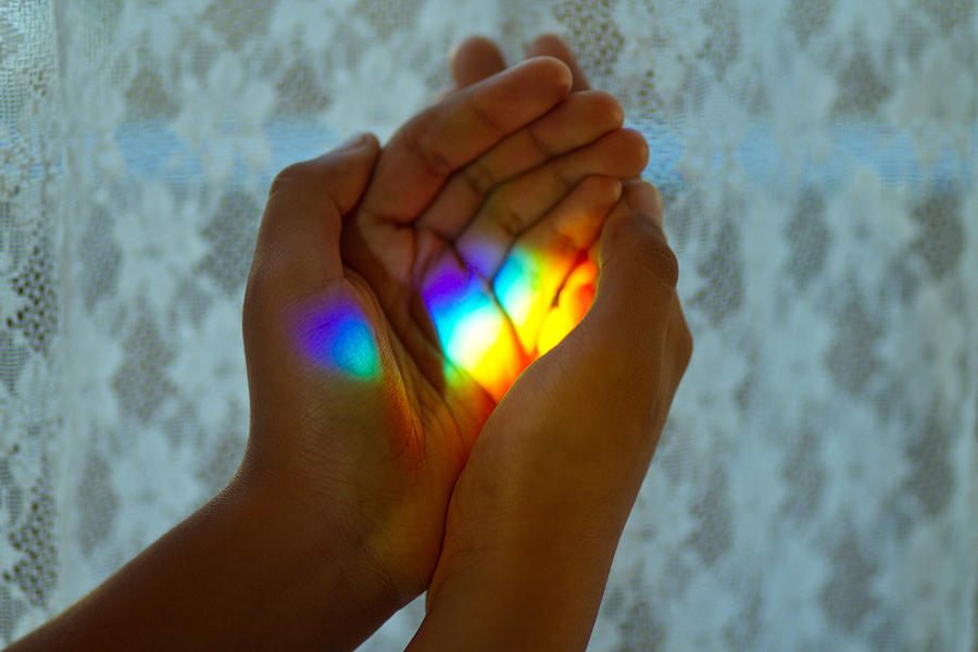Rainbow light in her hands Photograph by MamiGibbs