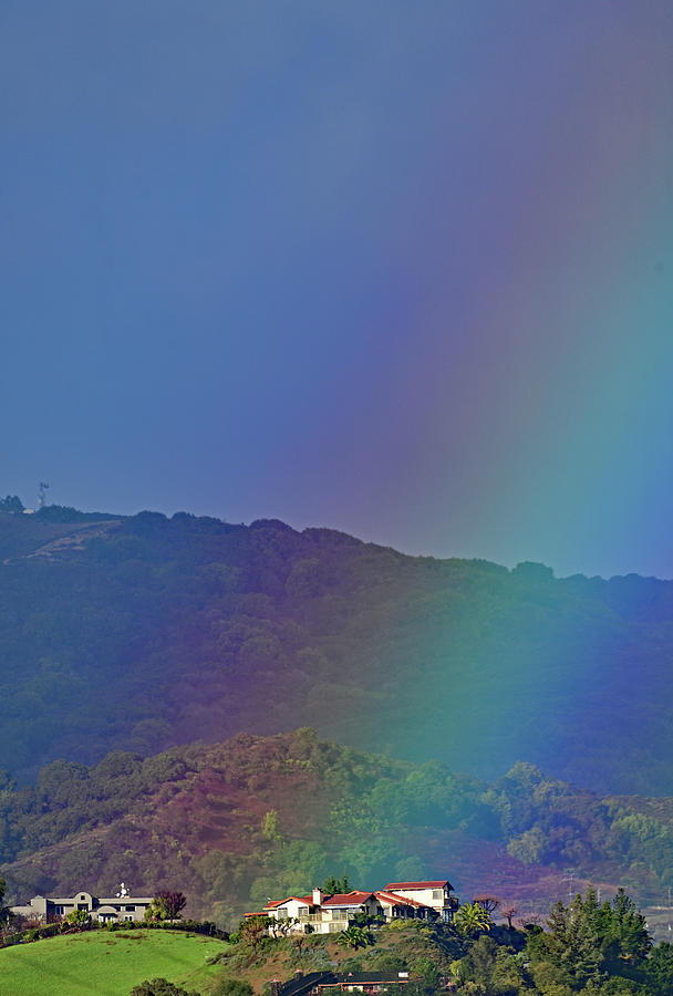 Rainbow lit Houses over the Mountains Photograph by Amazing Action Photo Video