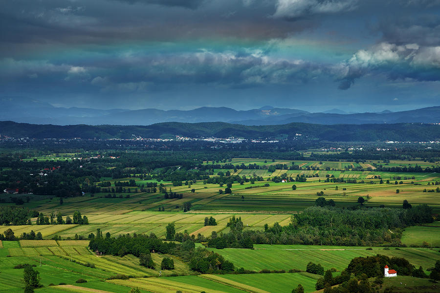 Rainbow over Ljubljana Photograph by Ian Middleton