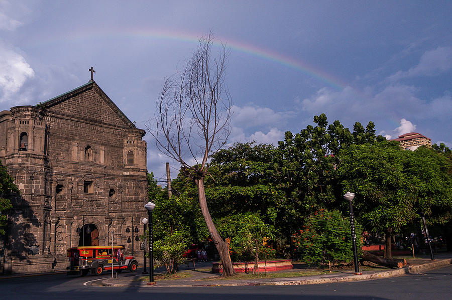 Rainbow over Malate Church Photograph by Arj Munoz