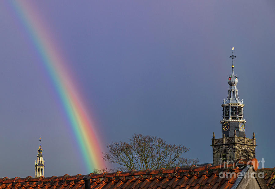 Rainbow over StJohns church Photograph by Casper Cammeraat